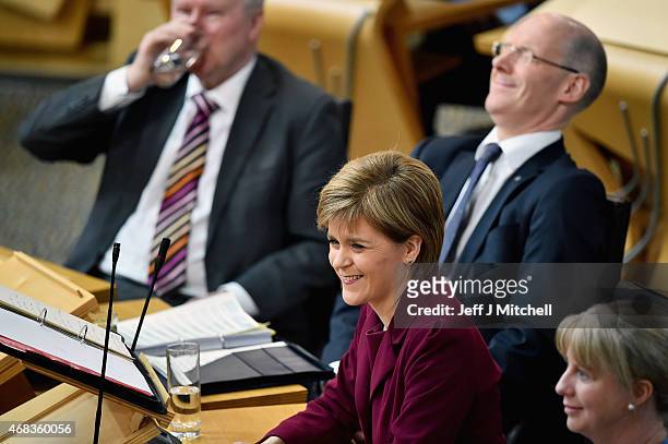 First Minister Nicola Sturgeon attends First Minister's Questions at the Scottish Parliament on April 2, 2015 in Edinburgh, Scotland. Tonight will...