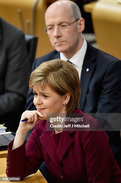 First Minister Nicola Sturgeon attends First Minister's Questions at the Scottish Parliament on April 2, 2015 in Edinburgh, Scotland. Tonight will...