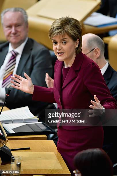 First Minister Nicola Sturgeon attends First Minister's Questions at the Scottish Parliament on April 2, 2015 in Edinburgh, Scotland. Tonight will...