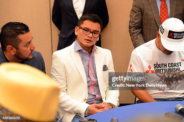Marcos "El Chino" Maidana answers questions from the media before he and Floyd "Money" Mayweather hosted a Times Square press conference in New York...
