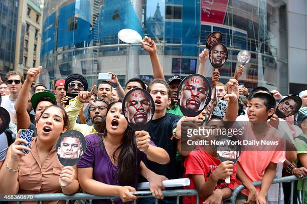 Maidana fans cheer for their boxer when Floyd "Money" Mayweather and Marcos "El Chino" Maidana hosted a Times Square press conference in New York...