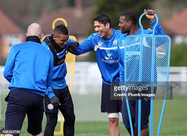 Leicester's Danny Simpson, Leo Ulloa and Wes Morgan enjoy a joke during the Leicester City training session at Belvoir Drive Training Ground on April...