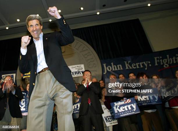 Democratic presidential candidate, US Senator John Kerry takes to the stage prior to speaking at a rally with at Ohio State University 01 March 2004...