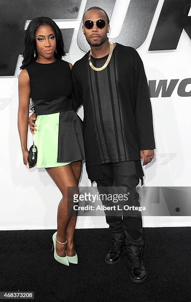 Recording artiat Sevyn Streeter and guest arrive for the Premiere Of Universal Pictures' "Furious 7" held at TCL Chinese Theatre on April 1, 2015 in...