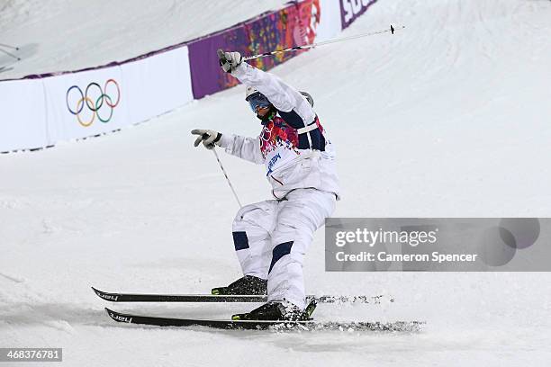 Patrick Deneen of the United States competes in the Men's Moguls Finals on day three of the Sochi 2014 Winter Olympics at Rosa Khutor Extreme Park on...