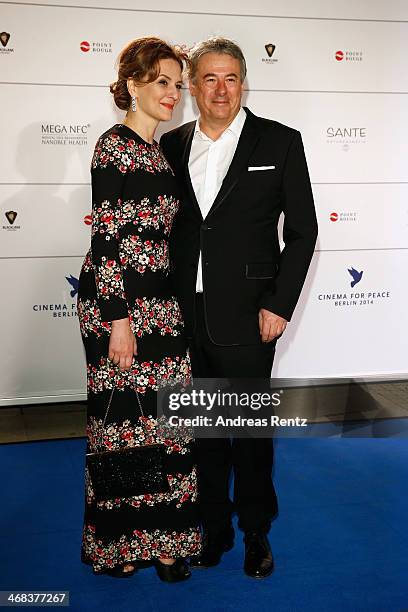 Martina Gedeck and Markus Imboden arrive for the Cinema For Peace 2014 - Gala at Konzerthaus Am Gendarmenmarkt on February 10, 2014 in Berlin,...