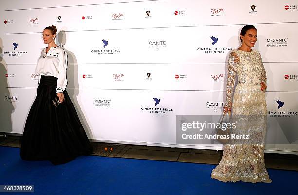 Uma Thurman and Sonja Kirchberger arrive for the Cinema For Peace 2014 - Gala at Konzerthaus Am Gendarmenmarkt on February 10, 2014 in Berlin,...