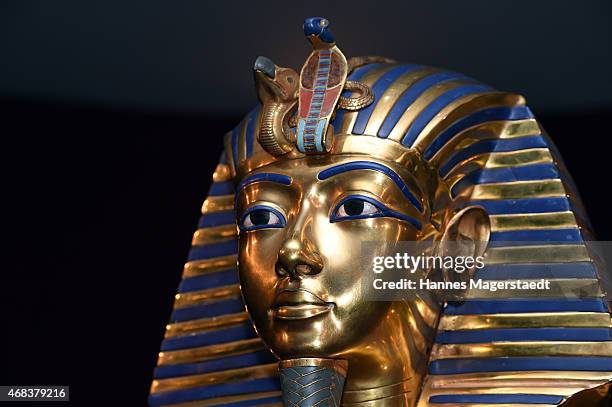 The burial mask of Egyptian Pharaoh Tutankhamun is shown during the 'Tutanchamun - Sein Grab und die Schaetze' Exhibition Preview at Kleine...