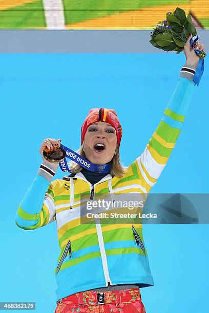 Gold medalist Maria Hoefl-Riesch of Germany celebrates during the medal ceremony for the Alpine Skiing Women's Super Combined on day 3 of the Sochi...