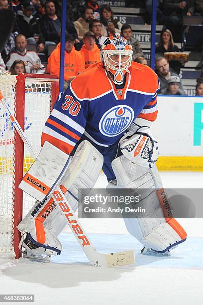 Ben Scrivens of the Edmonton Oilers prepares to make a save during the game against the Winnipeg Jets on March 23, 2015 at Rexall Place in Edmonton,...