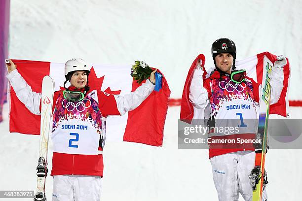 Gold medalist Alex Bilodeau of Canada celebrates with silver medalist Mikael Kingsbury of Canada after the Men's Moguls Finals on day three of the...