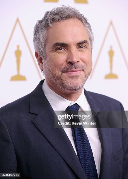 Director/writer Alfonso Cuarón attends the 86th Academy Awards nominees luncheon at The Beverly Hilton Hotel on February 10, 2014 in Beverly Hills,...