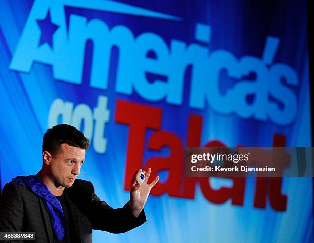 Magician Mat Franco winner of season nine of the reality competition series "America's Got Talent" performs during NBCUniversal Summer Press Day...