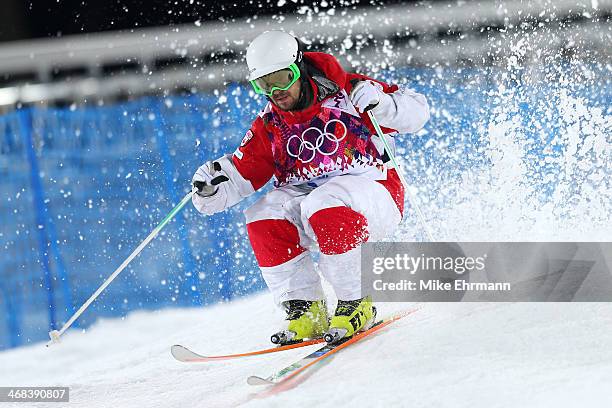 Philippe Marquis of Canada competes in the Men's Moguls Finals on day three of the Sochi 2014 Winter Olympics at Rosa Khutor Extreme Park on February...