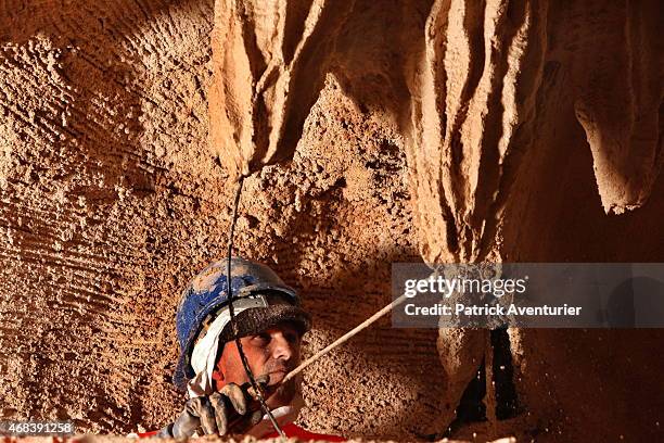 Man works on the full-size reproduction of Chauvet cave, an underground environment identical to the original that contains the world's oldest known...