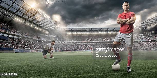 soccer players on pitch before game - football player standing stock pictures, royalty-free photos & images