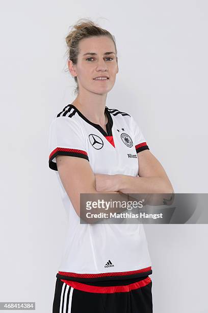 Simone Laudehr of Germany poses for a portrait during the DFB Women's Marketing Day at the Commerzbank-Arena on January 14, 2015 in Frankfurt am...