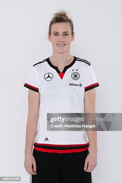 Simone Laudehr of Germany poses for a portrait during the DFB Women's Marketing Day at the Commerzbank-Arena on January 14, 2015 in Frankfurt am...