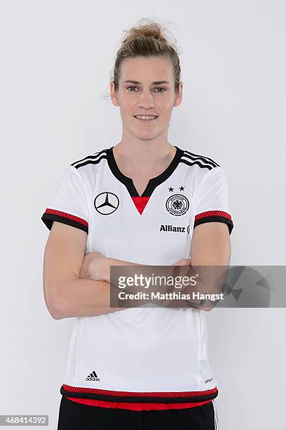 Simone Laudehr of Germany poses for a portrait during the DFB Women's Marketing Day at the Commerzbank-Arena on January 14, 2015 in Frankfurt am...