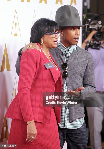 Academy of Motion Picture Arts and Sciences Board of Governors President Cheryl Boone Isaacs and singer/songwriter Pharrell Williams attends the 86th...