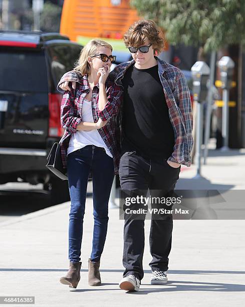 Actress Emma Roberts and her finace Evan Peters are seen on February 10, 2014 in Los Angeles, California.