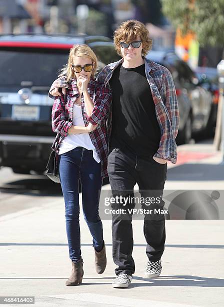 Actress Emma Roberts and her finace Evan Peters are seen on February 10, 2014 in Los Angeles, California.