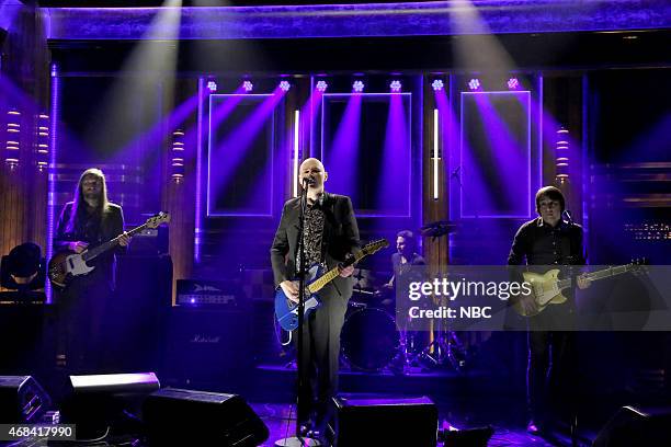 Episode 0238 -- Pictured: Mark Stoermer, Billy Corgan, Brad Wilk and Jeff Schroeder of musical guest The Smashing Pumpkins perform on April 2, 2015 --