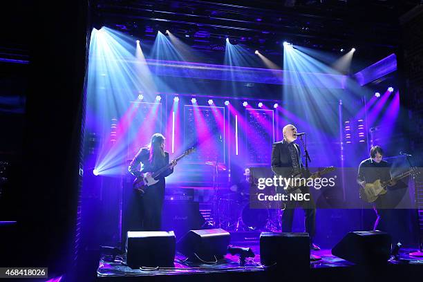 Episode 0238 -- Pictured: Mark Stoermer, Brad Wilk, Billy Corgan and Jeff Schroeder of musical guest The Smashing Pumpkins perform on April 2, 2015 --