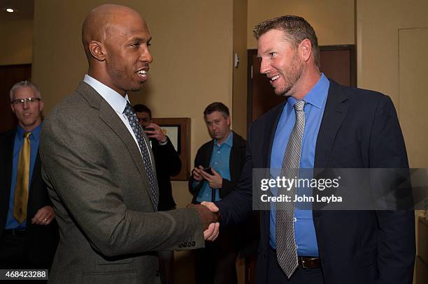 Hall of Fame Inductees Chauncey Billups and Roy Halladay congratulate each other at the 51st annual Colorado Sports Hall of Fame induction and awards...