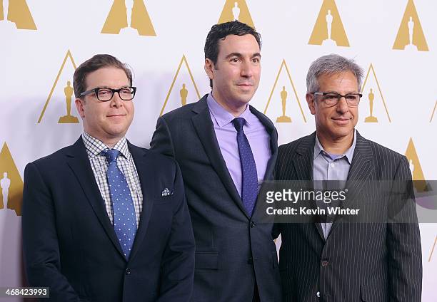 Writer Eric Warren Singer, producer Jonathan Gordon, and editor Alan Baumgarten attend the 86th Academy Awards nominee luncheon at The Beverly Hilton...