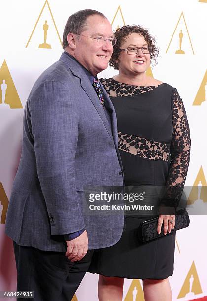 Board of Governors First Vice President - Short Films and Feature Animation Branch John Lasseter and Nancy Lasseter attend the 86th Academy Awards...