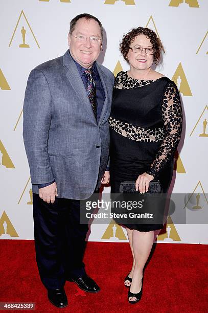 Board of Governors First Vice President - Short Films and Feature Animation Branch John Lasseter and Nancy Lasseter attend the 86th Academy Awards...