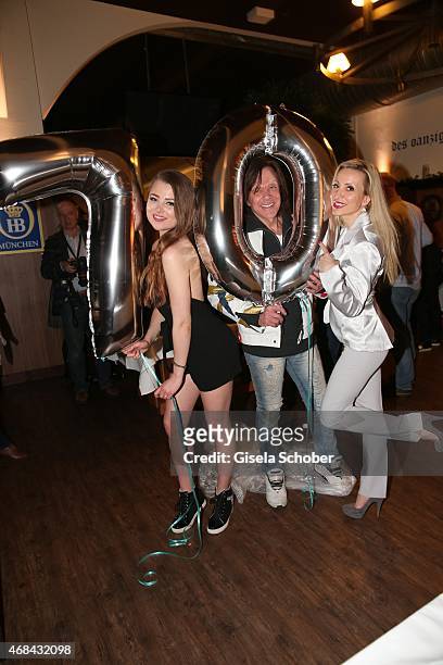 Singer Juergen Drews with his daughter and his wife Ramona Drews during Juergen Drews' 70th Birthday Party at Hofbraeuhaus on April 02, 2015 in...