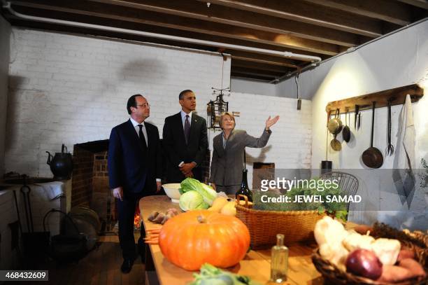 President Barack Obama and his French counterpart Francois Hollande, with President of Thomas Jefferson Foundation Leslie Greene Bowman , tour the...