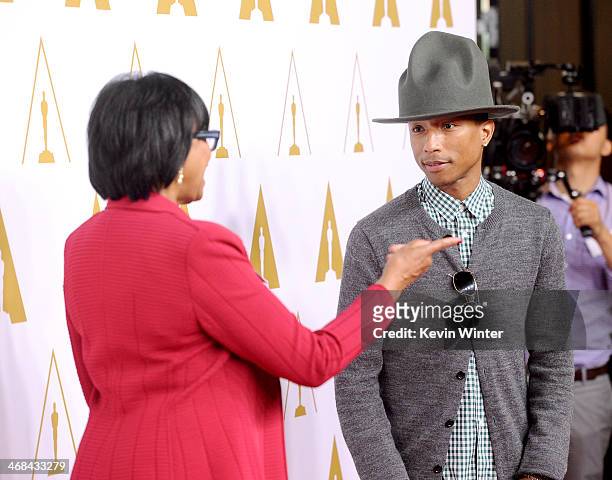 Academy of Motion Picture Arts and Sciences Board of Governors President Cheryl Boone Isaacs and singer/songwriter Pharrell Williams attends the 86th...