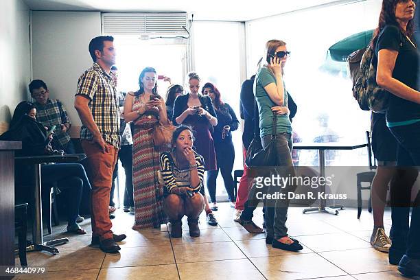 Customers wait for roughly 2.5 hours for a free coffee at Dumb Starbucks in the Los Feliz neighborhood on February 10, 2014 in Los Angeles,...