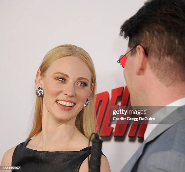 Actress Deborah Ann Woll and E.J. Scott arrive at the premiere Of Netflix's "Marvel's Daredevil" at Regal Cinemas L.A. Live on April 2, 2015 in Los...