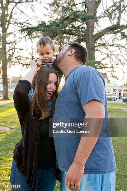 family in a park together - hazel bond stock pictures, royalty-free photos & images