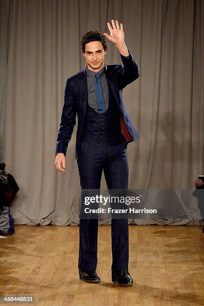 Designer Zac Posen poses on the runway at the Zac Posen fashion show during Mercedes-Benz Fashion Week Fall 2014 on February 10, 2014 in New York...