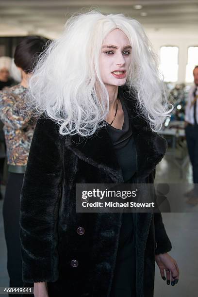 Model prepares before the Thom Browne Women's show during Mercedes-Benz Fashion Week Fall 2014 at Center 548 on February 10, 2014 in New York City.