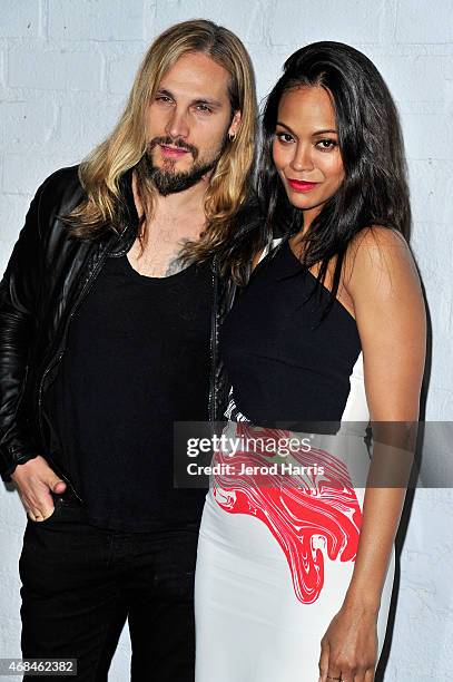 Marco Perego and Zoe Saldana arrive at Samsung celebrates the launch of Galaxy S 6 and Galaxy S 6 edge at Quixote Studios on April 2, 2015 in Los...