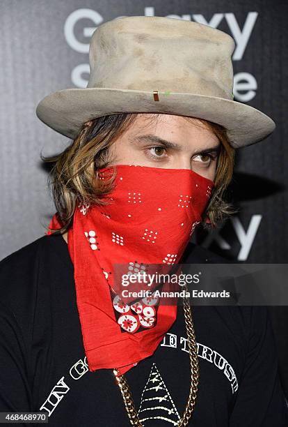 Street artist Alec Monopoly arrives at the launch of Samsung's Galaxy S 6 and Galaxy S 6 Edge at Quixote Studios on April 2, 2015 in Los Angeles,...