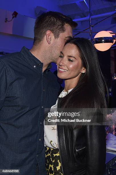 Player Aaron Rodgers and actress Olivia Munn attend the Samsung Galaxy S 6 edge launch on April 2, 2015 in Los Angeles, California.