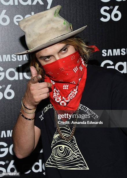 Street artist Alec Monopoly arrives at the launch of Samsung's Galaxy S 6 and Galaxy S 6 Edge at Quixote Studios on April 2, 2015 in Los Angeles,...