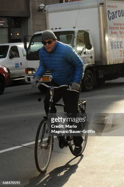 Matthew Broderick is seen on his bicycle on December 19, 2012 in New York City.
