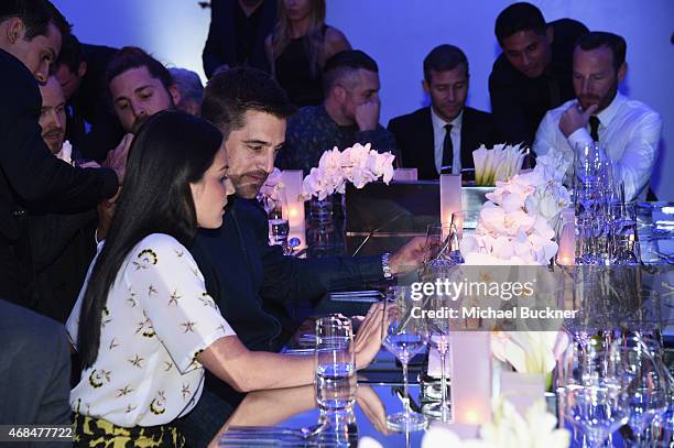 Actress Olivia Munn and NFL player Aaron Rodgers attend the Samsung Galaxy S 6 edge launch on April 2, 2015 in Los Angeles, California.