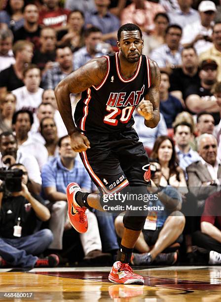 Center Greg Oden of the Miami Heat plays during a game against the Detroit Pistons at AmericanAirlines Arena on February 3, 2014 in Miami, Florida....