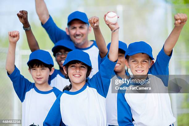 little league baseball - coach cheering stock pictures, royalty-free photos & images