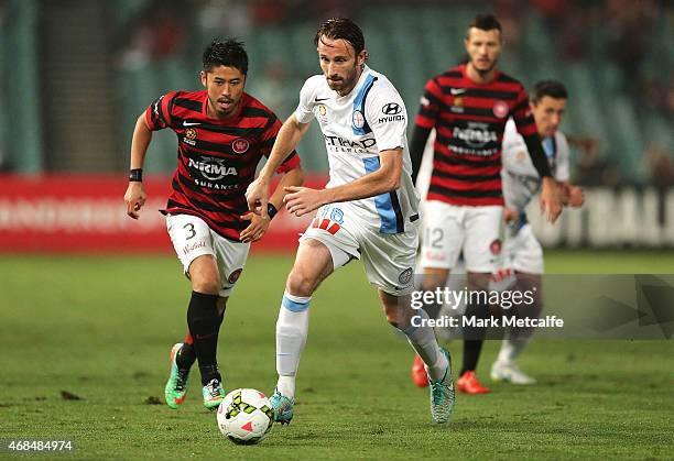 Josh Kennedy of Melbourne runs at the Wanderers defence during the round 24 A-League match between the Western Sydney Wanderers and Melbourne City FC...