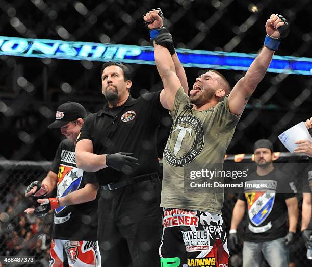 Jeremy Stephens celebrates while having his arm raised in victory after a featherweight bout during UFC on Fox 10 Henderson v Thomson at United...
